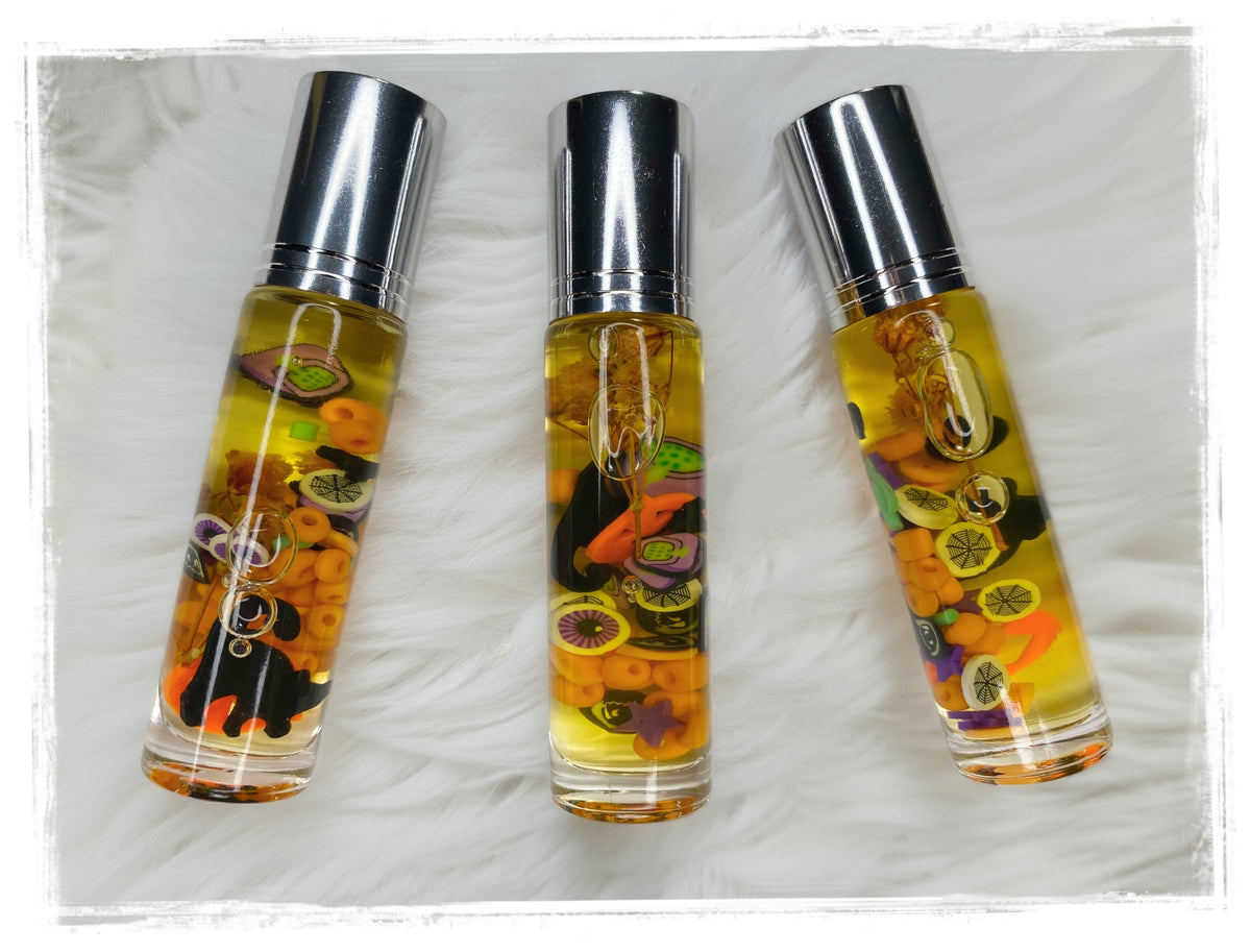 Boo Juice Roll-On Perfume Oil displayed on a white faux fur background.
