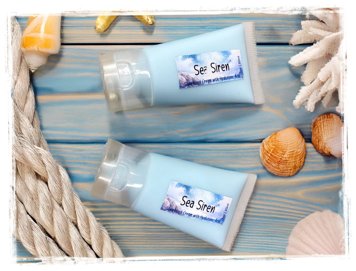 Two tubes of 'Sea Siren' cream on a wooden surface with seashells and rope.