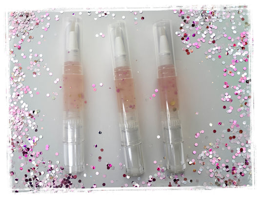 Close-up of portable jelly perfume nail pen applicator showing twist mechanism