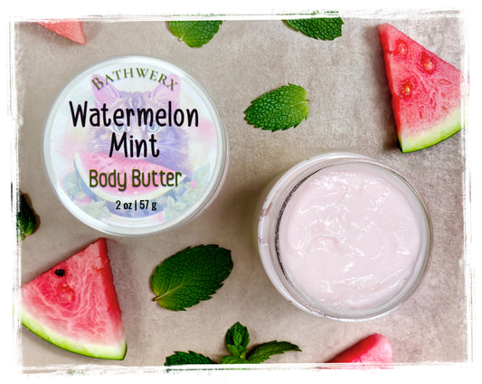 BathWerx Watermelon Mint Body Butter 2oz open jar with whipped pink cream, flatlay with watermelon and mint