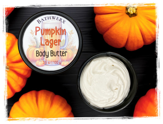 BathWerx Pumpkin Lager Body Butter 3.5 oz in a black jar, surrounded by orange pumpkins on a dark background.