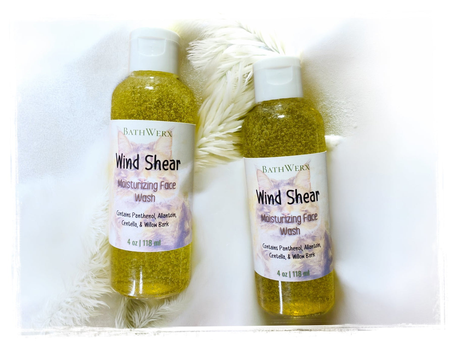 Wind Shear moisturizing face wash bottles with botanical ingredients on black and yellow background