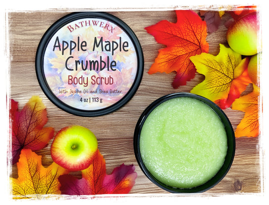 Apple Maple Crumble exfoliating body scrub by BathWerx, open 4 oz jar of green sugar scrub with apples and fall leaves.