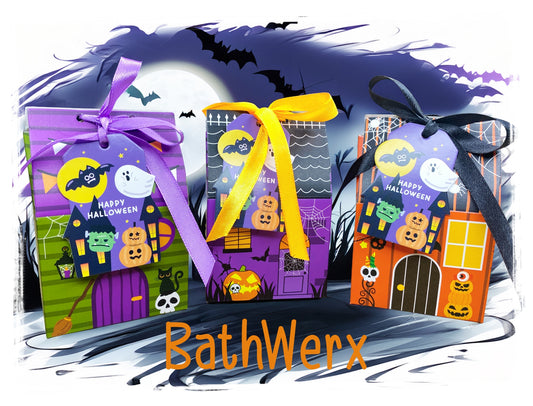 BathWerx Halloween Boo Boxes with colorful haunted-house designs and festive purple, yellow, and black ribbon bows.