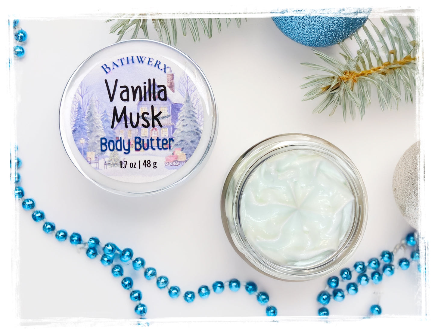 Vanilla Musk body butter jar with lid on a decorative background