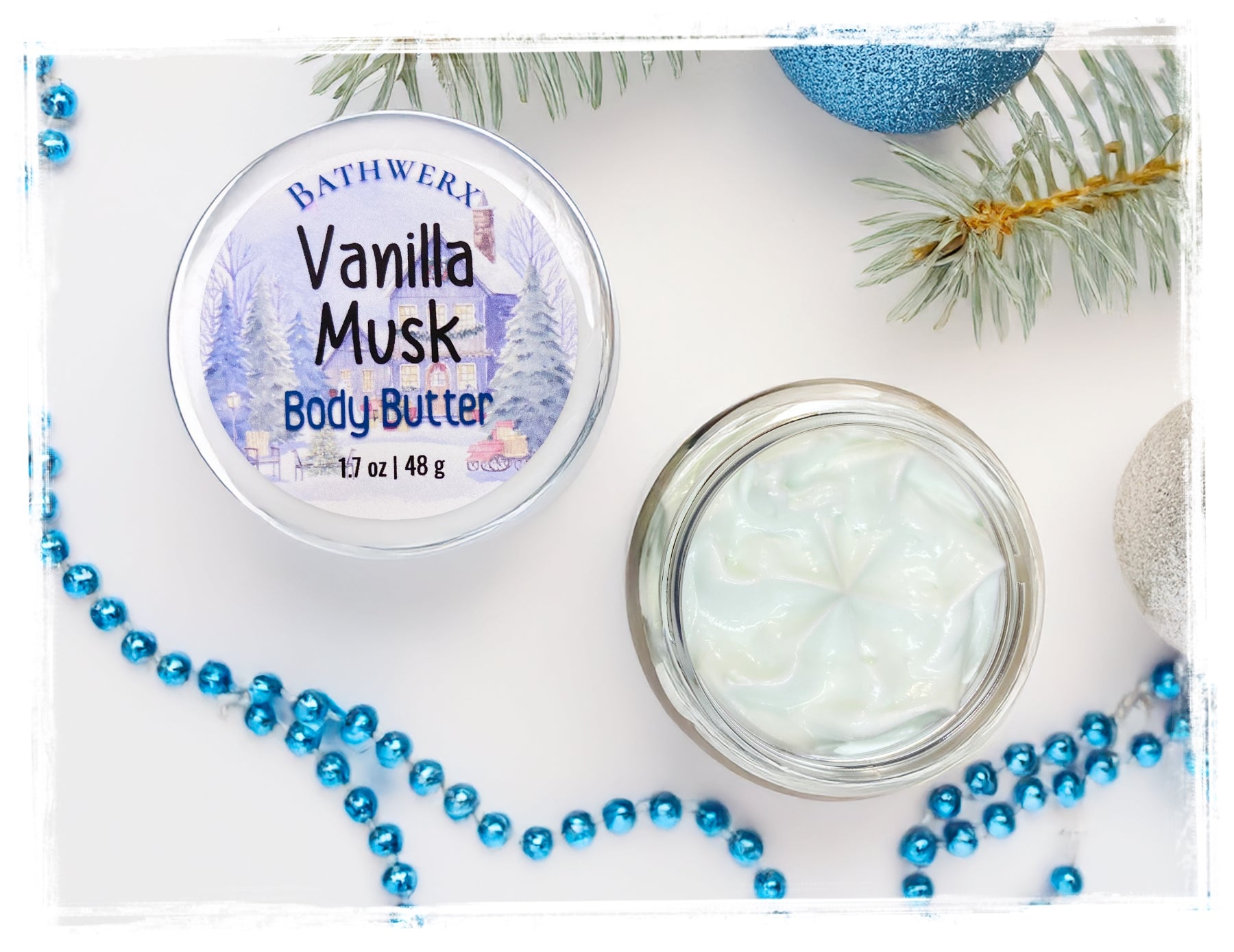 Vanilla Musk body butter jar with lid on a decorative background