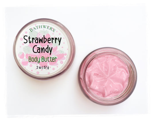 Jar of Strawberry Candy Body Butter with pink cream inside on a white background