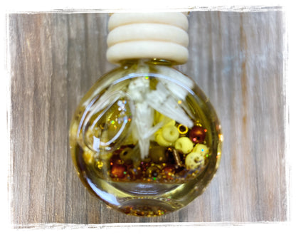 Bakery scented car charm with white flowers on wood - luxury gourmand fragrance air freshener