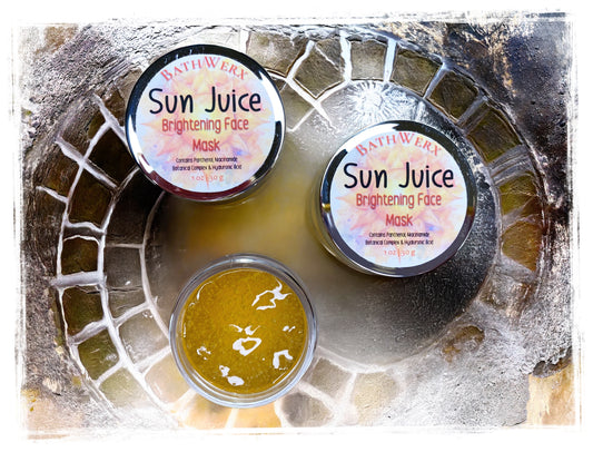 Three jars of Bathwerx Sun Juice Brightening Face Mask on a textured surface.