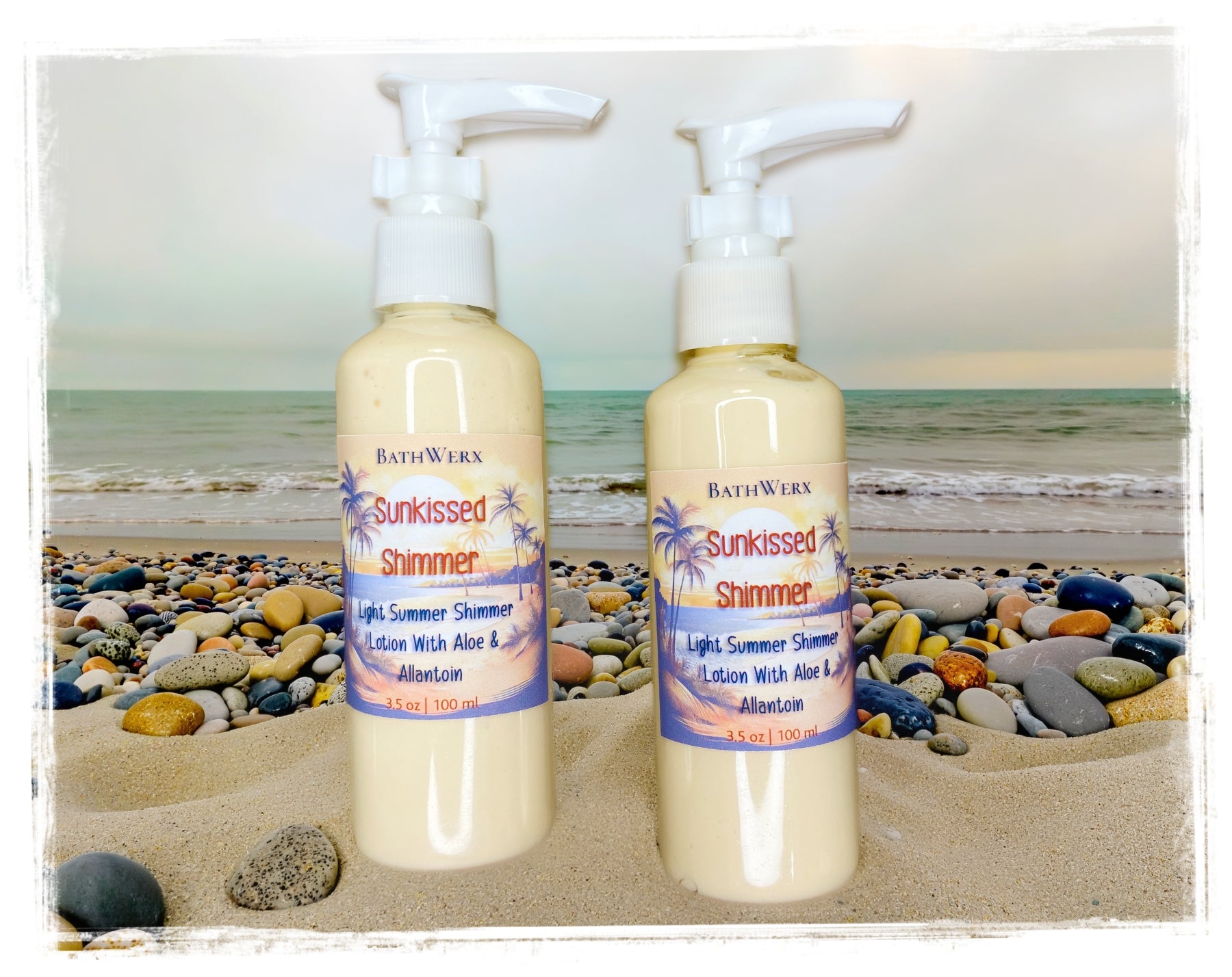 BathWerx Sunkissed Shimmer Lightweight Lotion — two 3.5 oz pump bottles on sandy beach with colorful pebbles and ocean waves in background