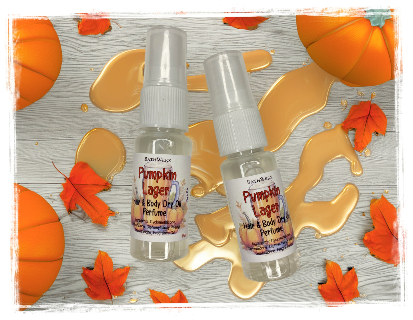 BathWerx Pumpkin Lager Hair & Body Dry Oil Perfume in two clear spray bottles, surrounded by orange pumpkins, fall leaves, and a golden oil splash on a wood background.