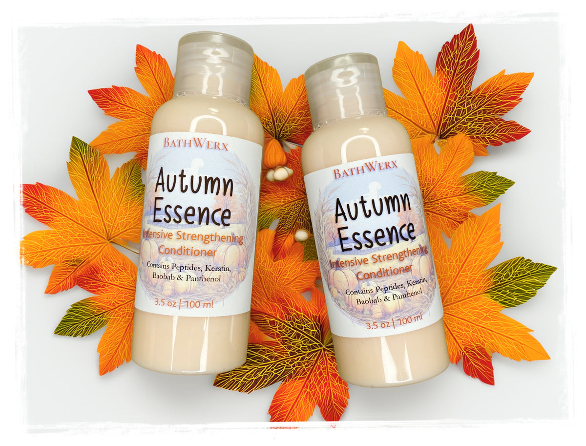 BathWerx Autumn Essence Intensive Strengthening Conditioner 3.5 oz bottles with Peptides, Keratin, Baobab and Panthenol, surrounded by colorful fall leaves on white background.