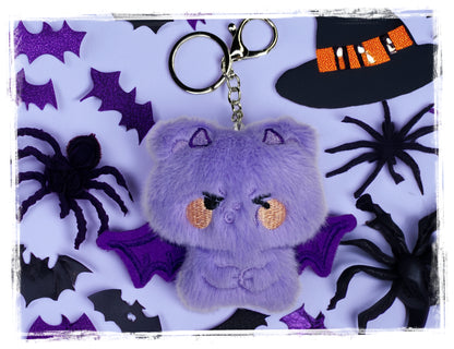 Lavender plush bat keychain with metal key ring and clasp.